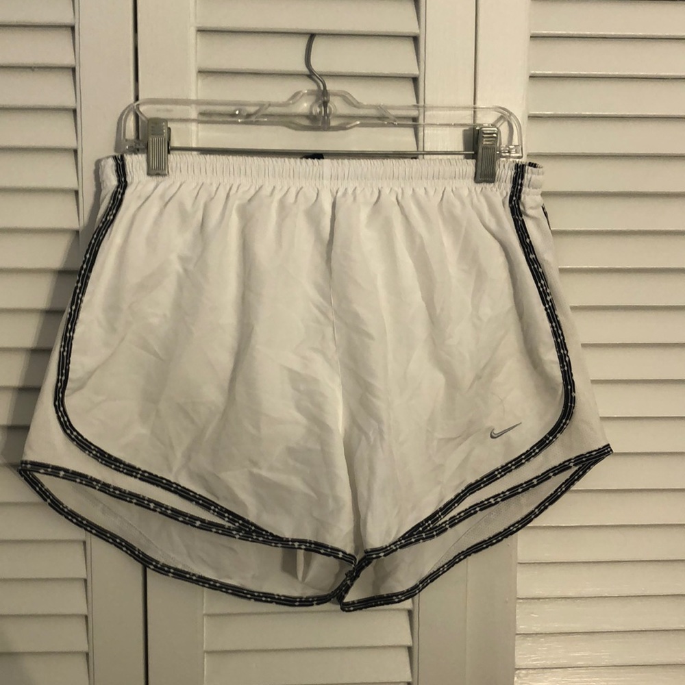 Women’s white and black nike running shorts.